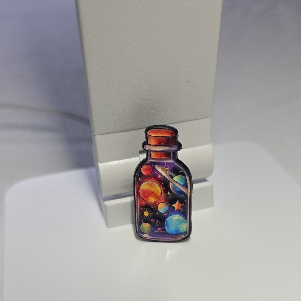Colorful Space-Themed Bottle Pin